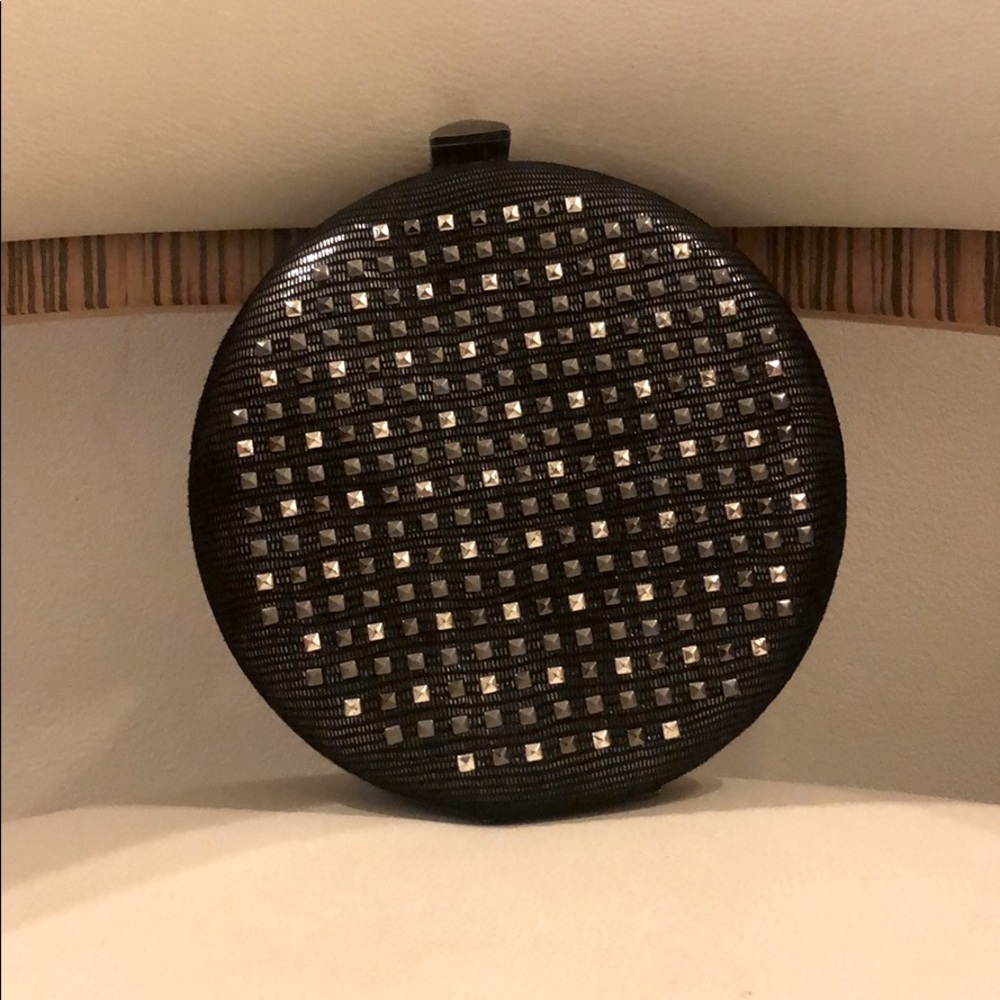 Judith Leiber circle studs clutch